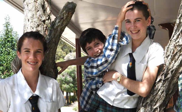 Abbey McNamara debuts her new look, with dad John, sister Beth, brother Daniel and mum Anne.